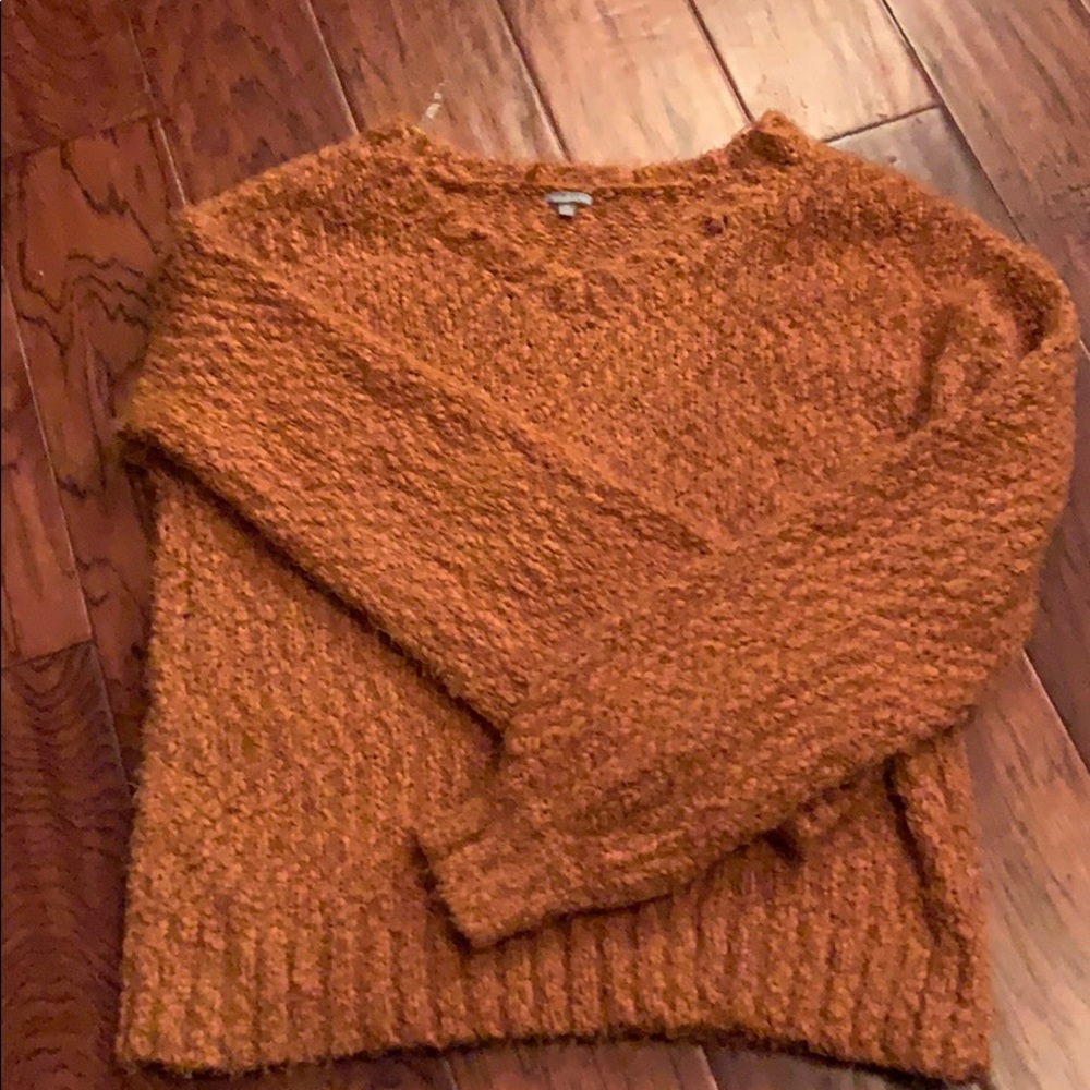 Light orange sweater